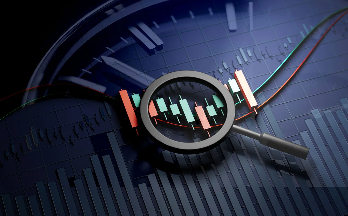 Magnifying Glass Above Stock Chart 